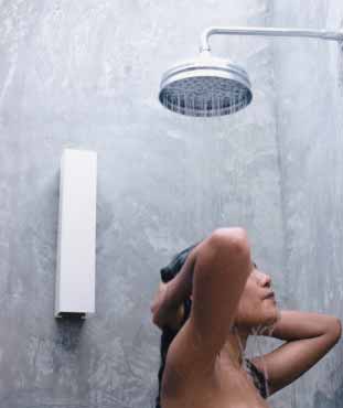 Woman showering using rain shower head
